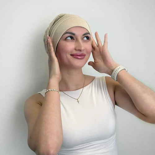 Sitter turbanen kvar utan hår under?